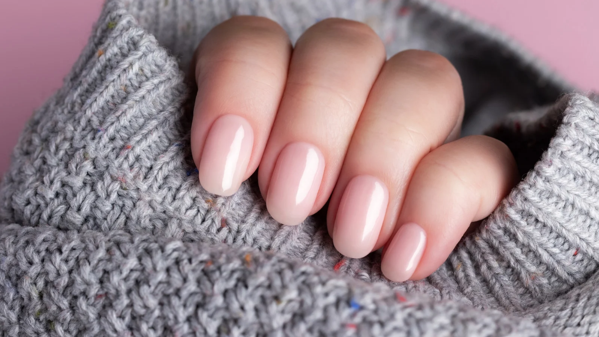 Healthy, shiny nails showing results of growing nails naturally at home