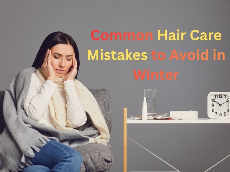 Girl holding her head showing common winter hair care mistakes like dryness, frizz, and damage.